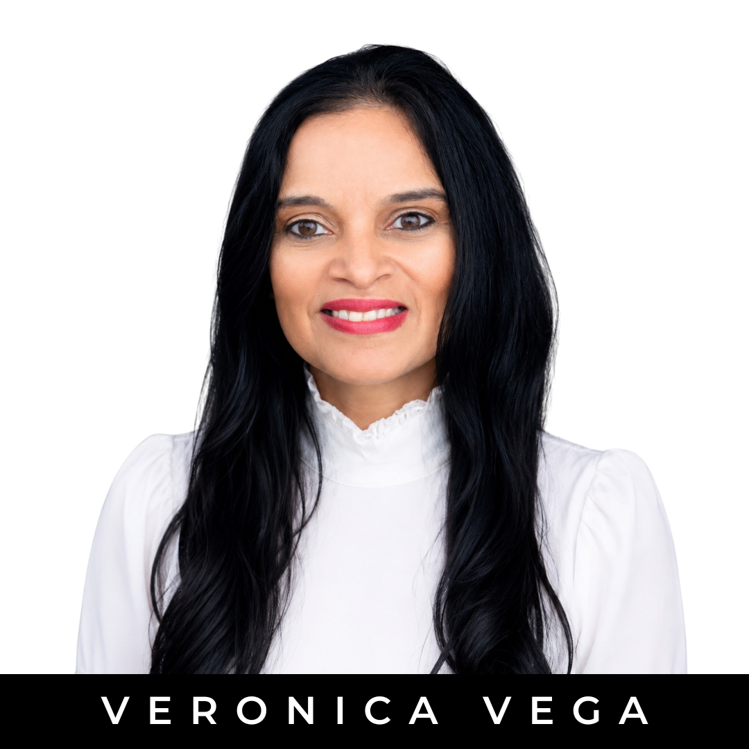 Portrait of a woman with long black hair smiling, wearing a white blouse with lace details, against a white background, with the name "Veronica Vega" displayed at the bottom.