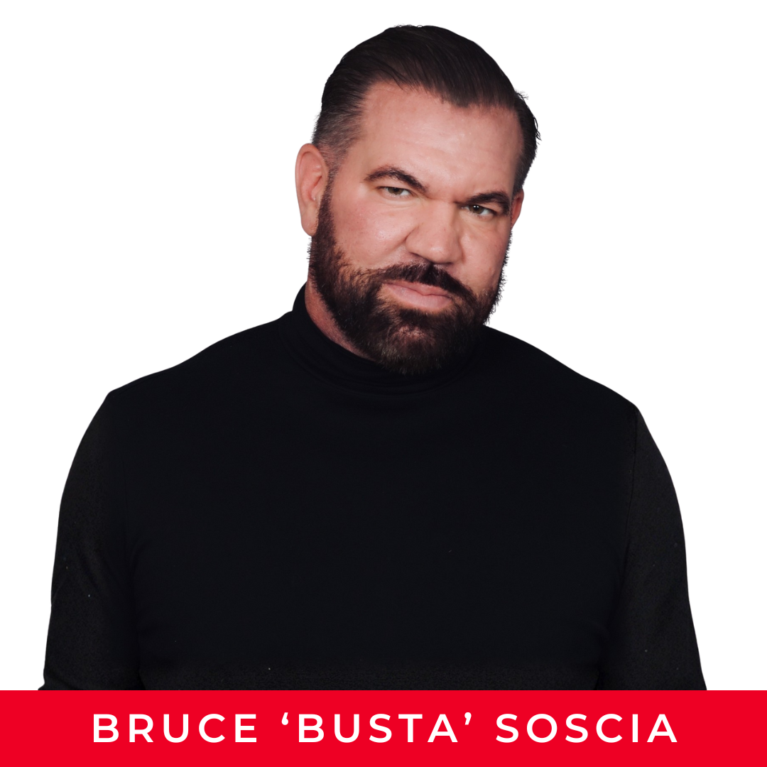Headshot of Bruce 'Busta' Soscia wearing a black turtleneck against a white background.