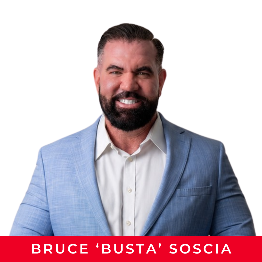 Headshot of Bruce 'Busta' Soscia wearing a black turtleneck against a white background.
