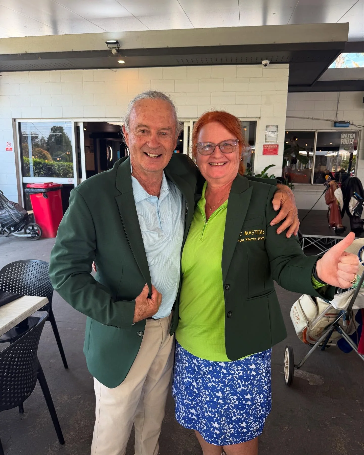 Bronwen and Tony sporting their Green Jackets. Congrats