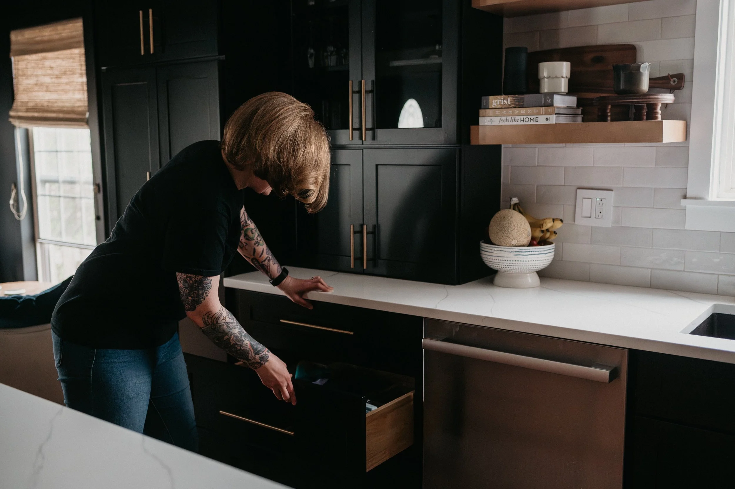 woman working on organizing a drawer