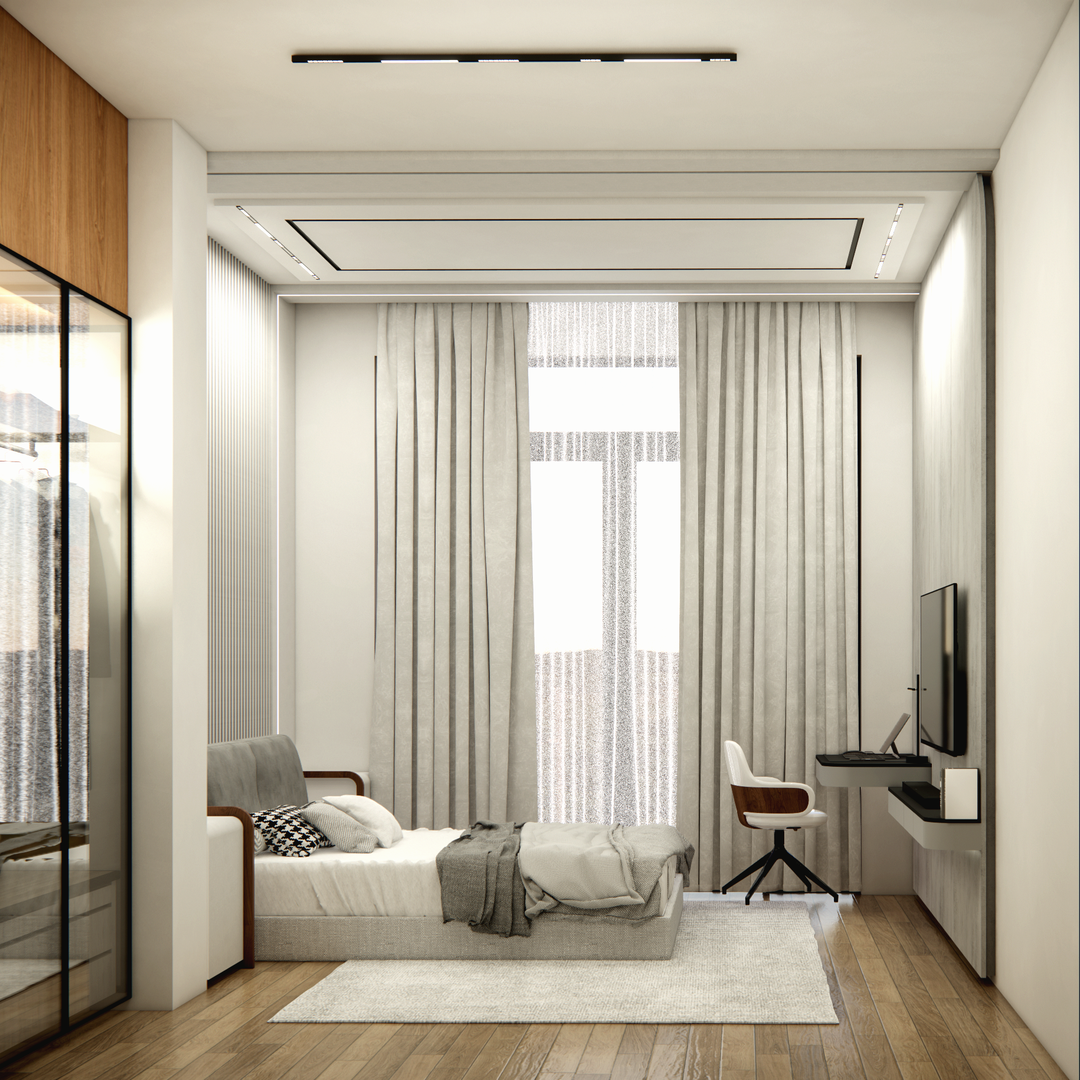 Minimalist bedroom with large window, gray bed with blankets and pillows, white rug, wall-mounted TV with floating desk, and a white chair with wooden armrests.