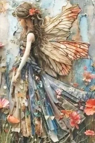 A fairy figure made of fabric and other materials with large butterfly wings, long wavy hair, and a floral dress, set against a weathered wall with scattered flowers.