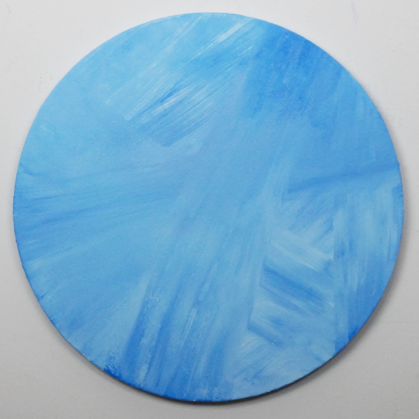 abstract blue circular painting by Nicole Javorsky