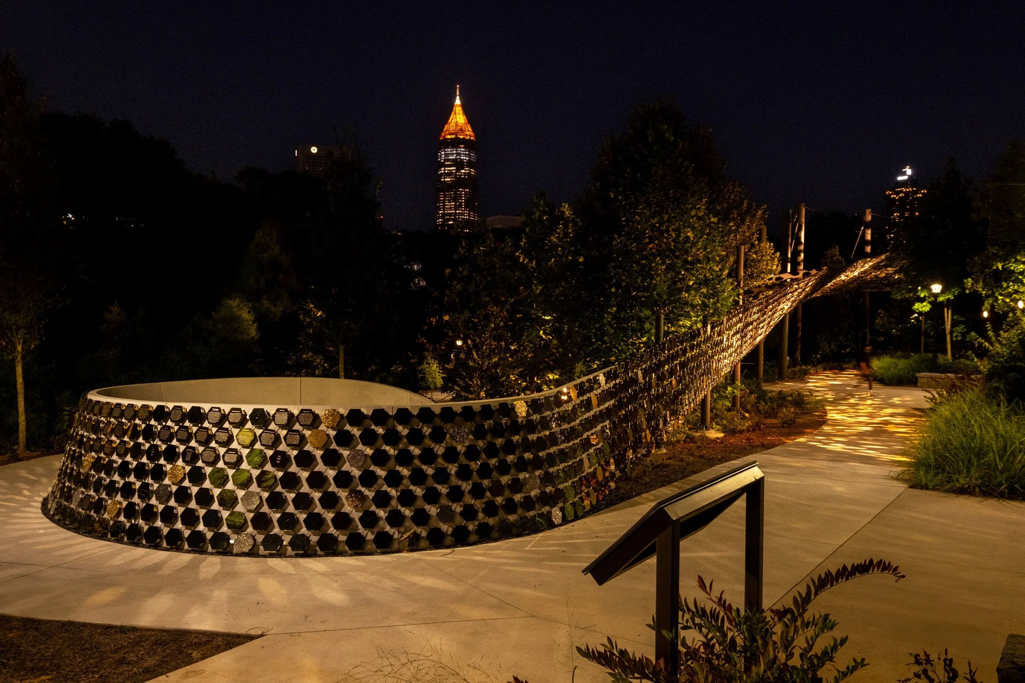 Pathway of Progress canopy installed at Georgia Tech by Bespoke Wire & Rope with hamma Architectural Inc, featuring stainless steel cables, cross clamps, and mirror-polished artwork panels.