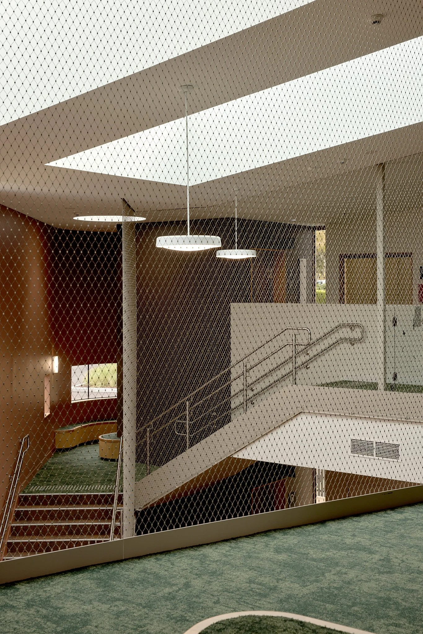 Flexi-mesh balustrades installed by Bespoke Wire & Rope at Monash Childcare Centre in Notting Hill VIC with Roberts Co and LAW Architects.