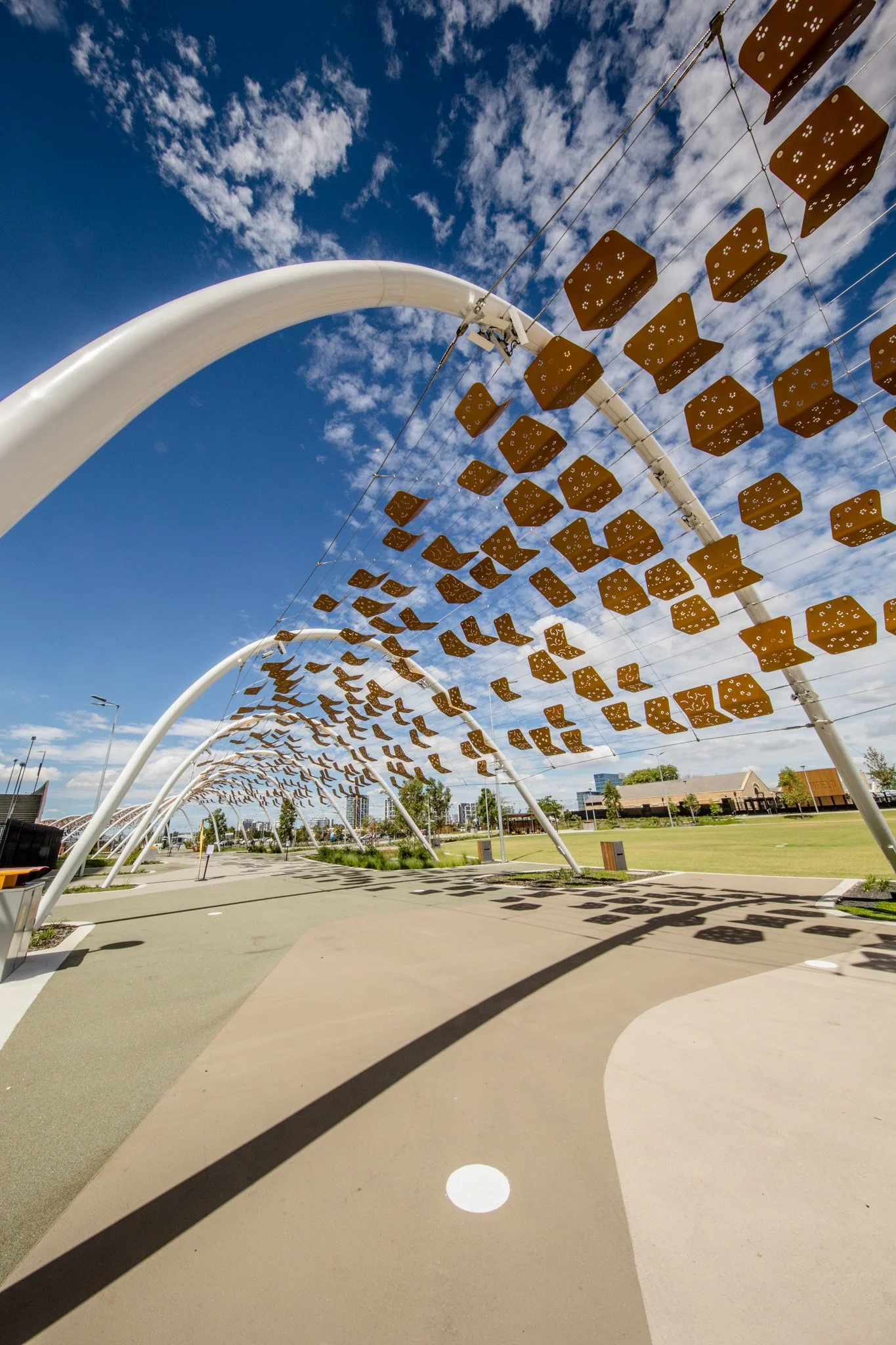 Bespoke Wire & Rope staff contributed to the Perth Stadium Arbour Walkway installation, a large-scale tensile cable project featuring 3,000 artwork tiles that tell Aboriginal stories through their unique placement.