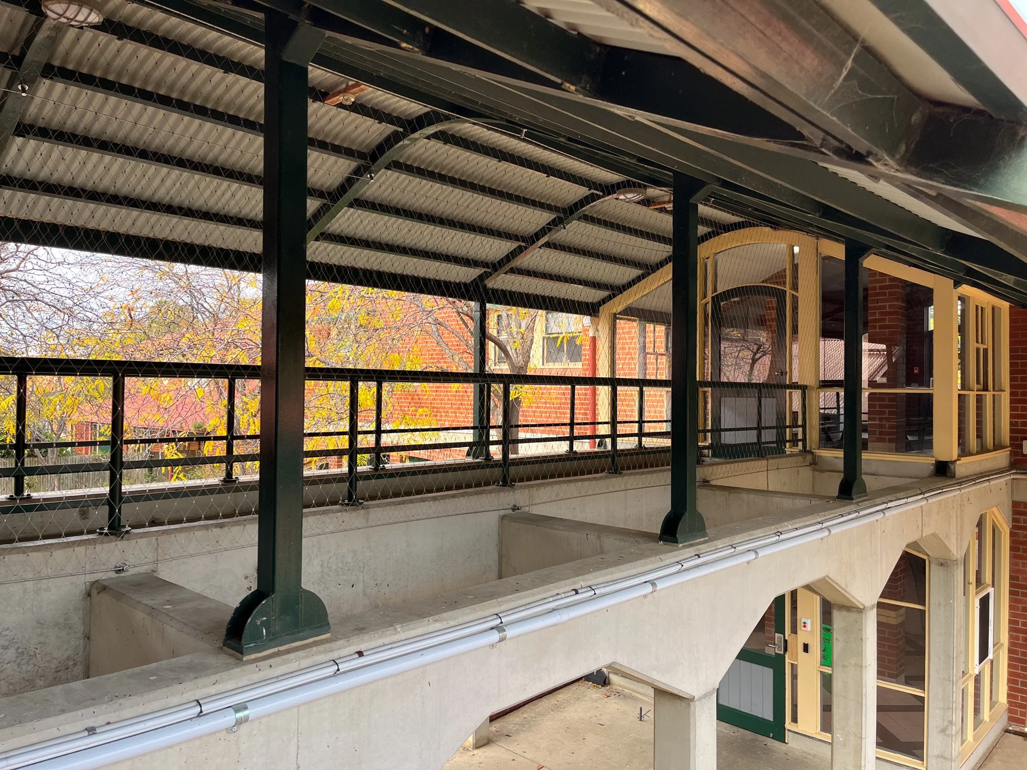 Walkway Flexi-mesh barriers installed by Bespoke Wire & Rope at Geelong Grammar VIC in partnership with Oxley Nets.