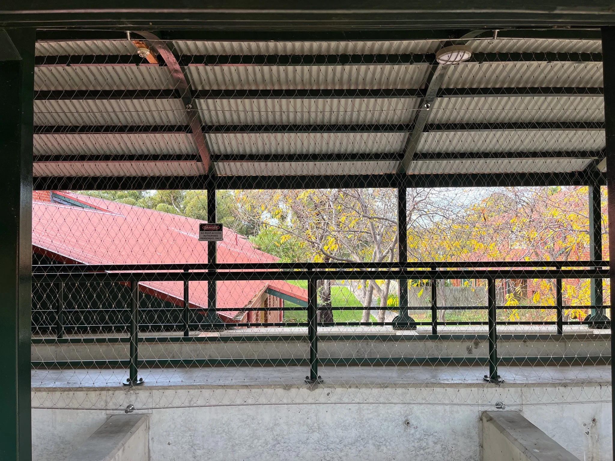 Walkway Flexi-mesh barriers installed by Bespoke Wire & Rope at Geelong Grammar VIC in partnership with Oxley Nets.