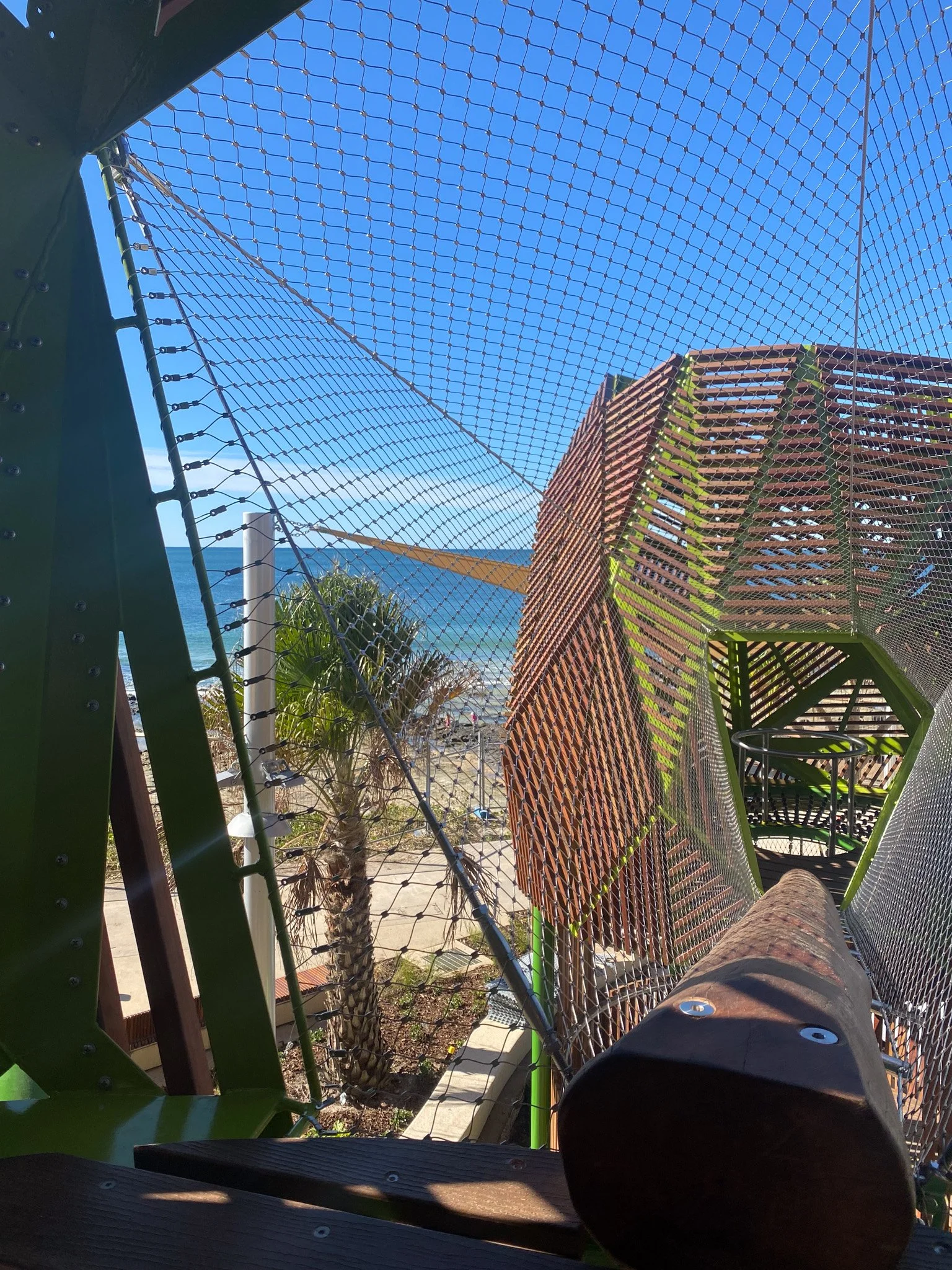 Flexi-mesh barriers installed by Bespoke Wire & Rope for Mooloolaba Foreshore Playground in QLD with Murphy Builders, Forge, AECOM, and Bark Architects.