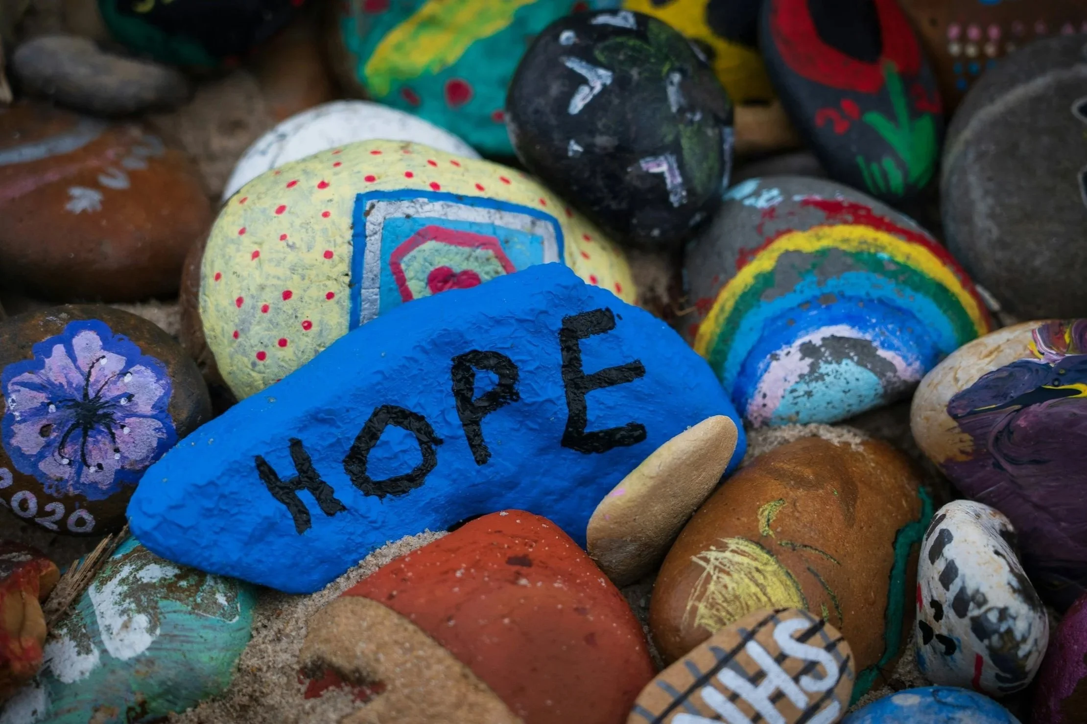 Painted rock with ‘hope’ – therapy for grief, loss, and life transitions in Indiana & Illinois