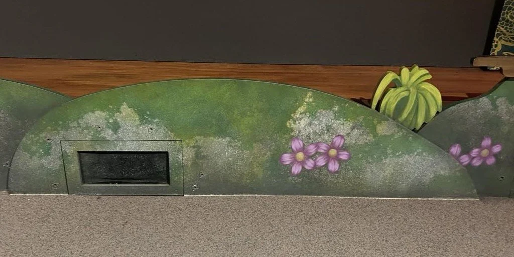 Stone, shrubbery and flowers