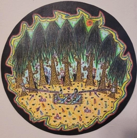 Colorful, circular drawing depicting a forest scene with tall trees, some with yellow and brown trunks, and a person lying on a blanket in a clearing. The scene is outlined with a multicolored, irregular border.