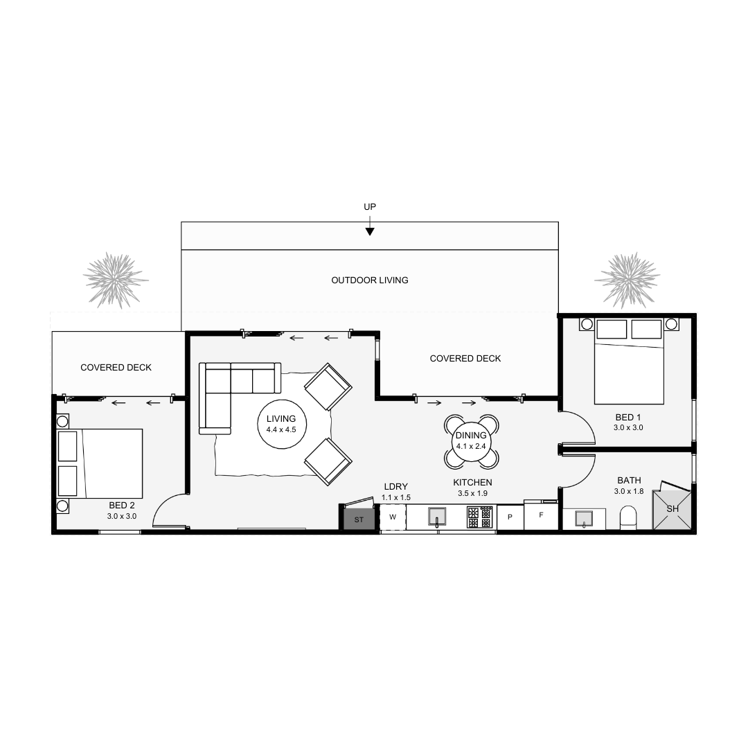 Floor plan of a house with two bedrooms, a living room, a kitchen, a bathroom, laundry area, covered decks, outdoor living space, and trees outside.
