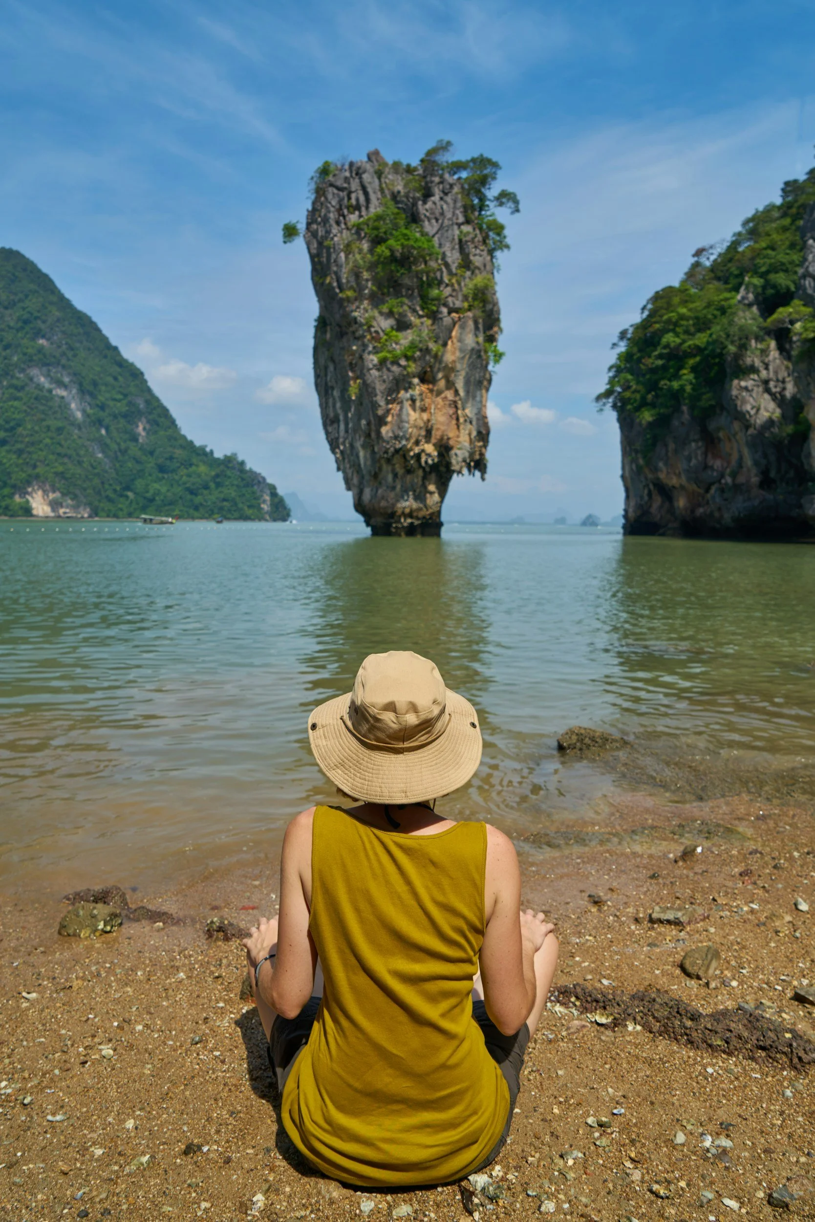 woman at beach looking at water