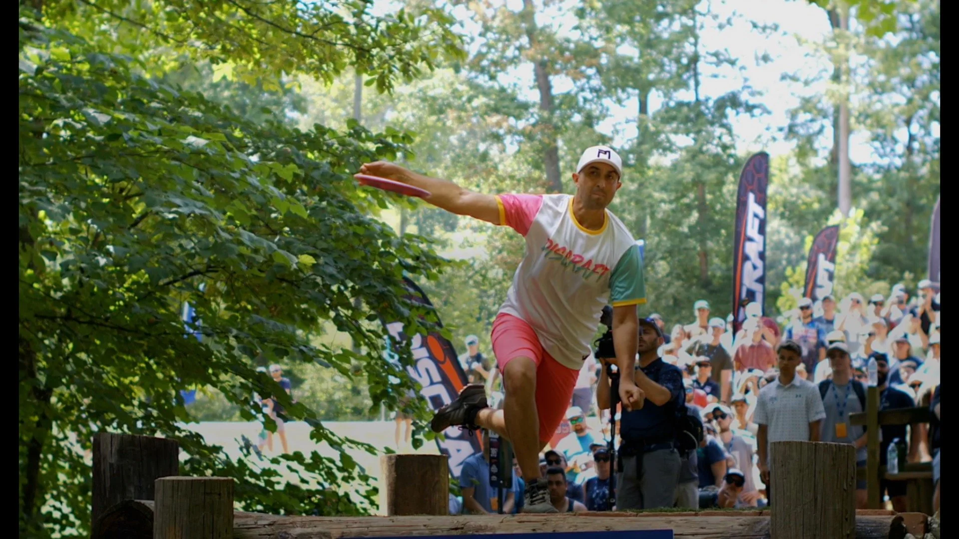 Professional disc golfer, paul mcbeth, tees off hole one at the world championship