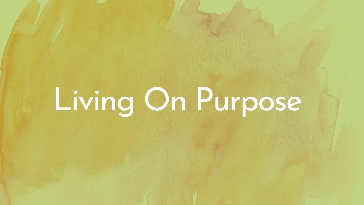 Text reading 'Living On Purpose' against a yellow watercolor background.