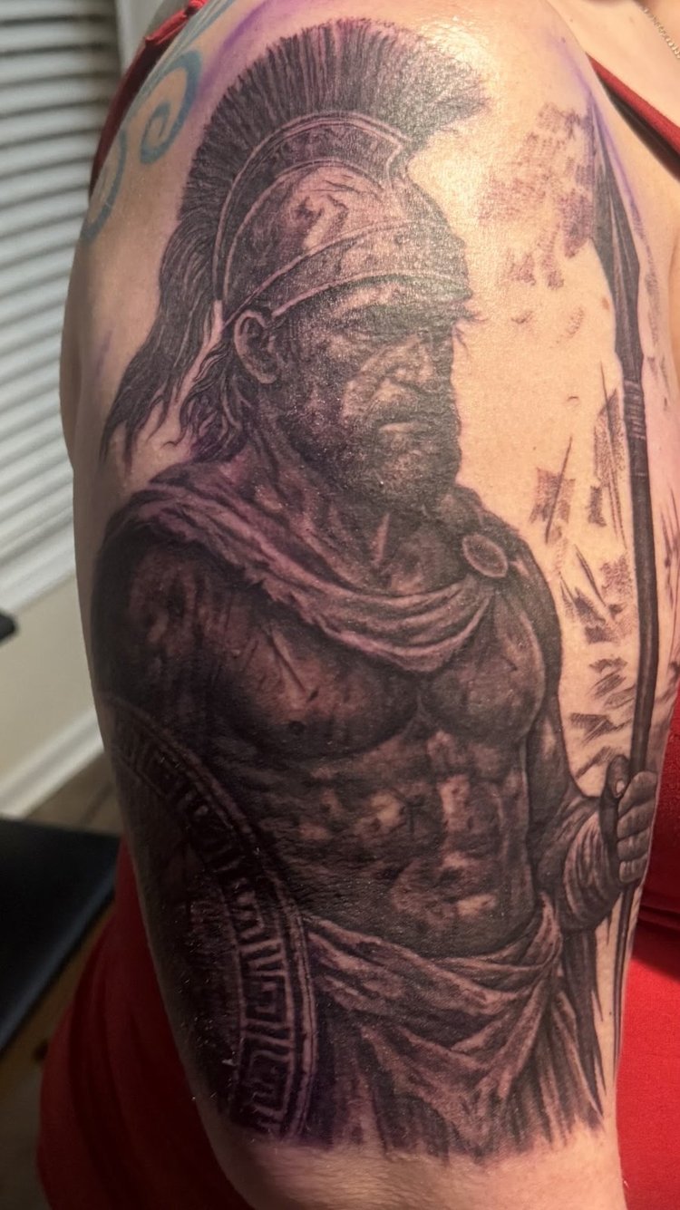 Tattoo by Allan Mandi from Linda Garland's Google review (photo 1 of 2)