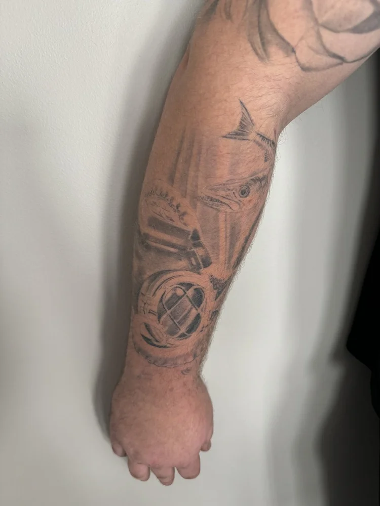 Tattoo by Allan Mandi from Brayden Garson's Google review