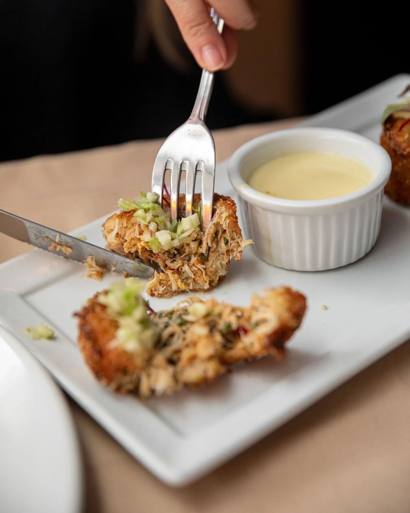 Crisp, golden, and full of flavor our homemade Crab Cakes with apple slaw, mango salsa &amp; lemon beurre blanc is to die for! Yummmmm! 

#desertmoon #palmsprings #dinner #dining #newrestaurant #hiddengem #downtown #palmspringsrestaurant #dinegps #cr