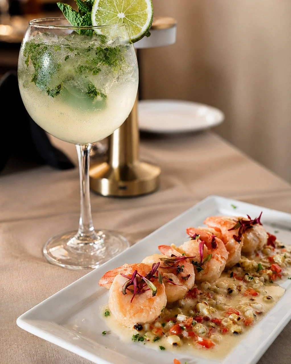 Fresh, vibrant, and crafted with intention 🍤🌿 Tequila Lime Shrimp alongside a handcrafted mojito, this is Palm Springs dining at its finest. Reserve your table at the link in bio. 

#palmsprings #dinegps #desertmoonps #restaurant #americancuisine