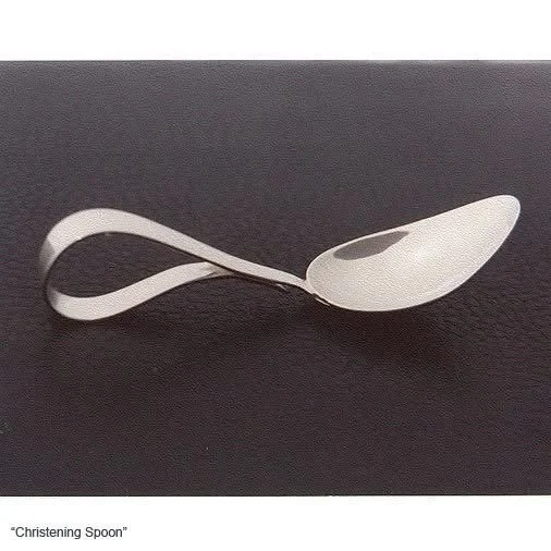 A spoon with a twisted handle, called a 'Christening Spoon'.