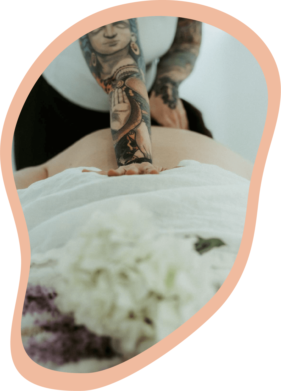 Massage Maven therapeutic massage session with focused bodywork for muscle tension relief in a calming wellness setting.