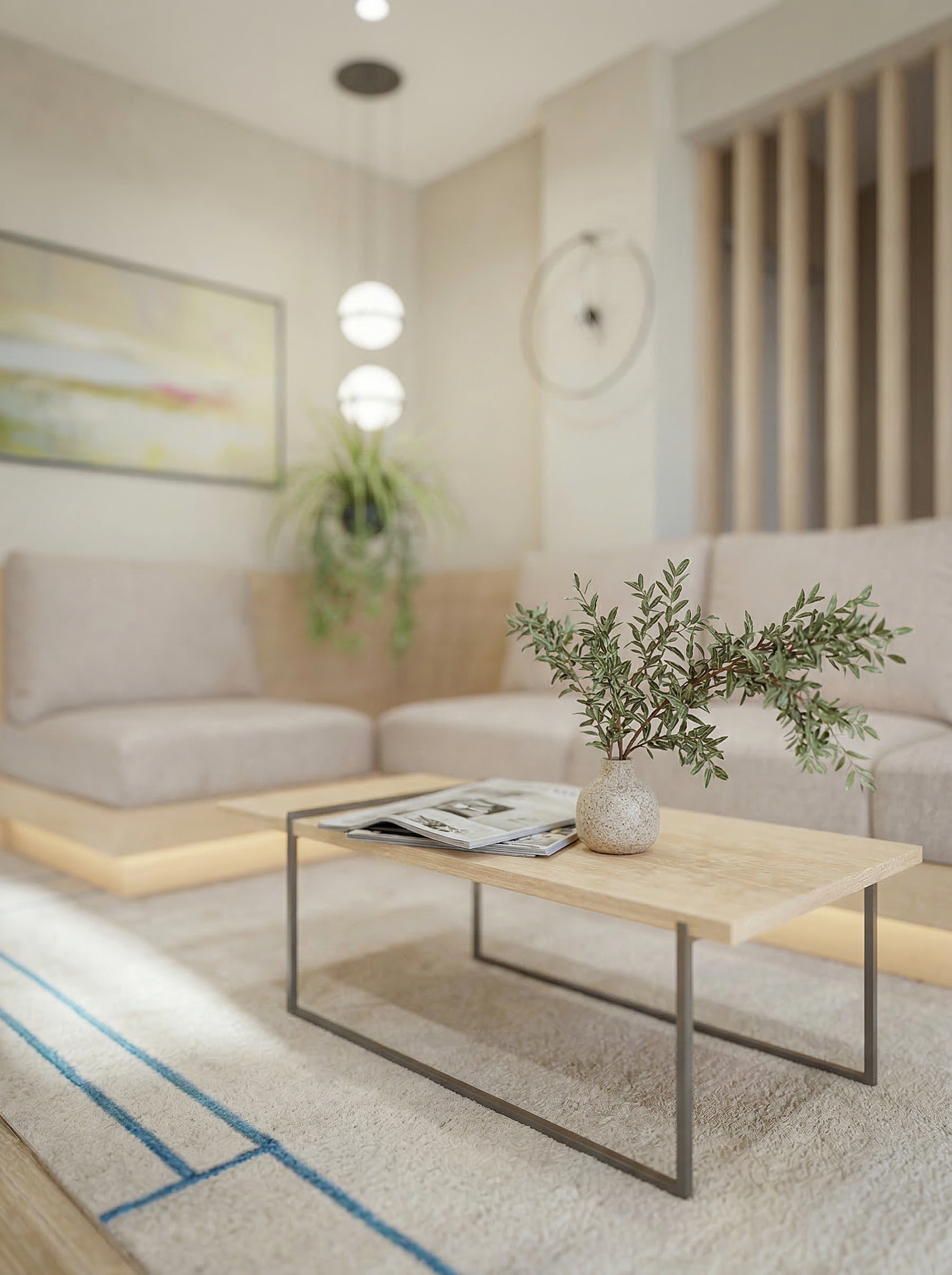 Modern living room with beige sectional sofa, wooden coffee table with metal legs, a small stone vase with green leaves, magazine on table, light-colored walls, artwork, and hanging pendant lights.