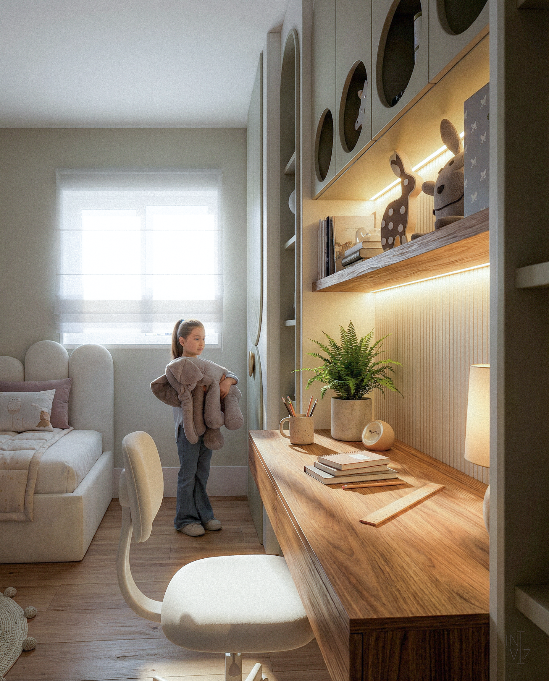 A girl standing in a well-lit bedroom holding a teddy bear, next to a wooden desk with books, a plant, and a lamp, and a cream-colored chair in front of the desk.