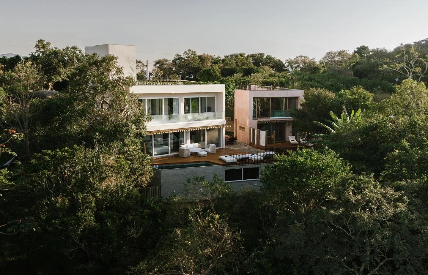 Jungle nestled &bull; Private Sea View Boutique Villa &bull; Cozy Casa offers a two-story main house - each floor has a private suite/apartment for up to 7 guests in total.
Right next door, you&rsquo;ll find the Pink House Studio, a cozy charming spa
