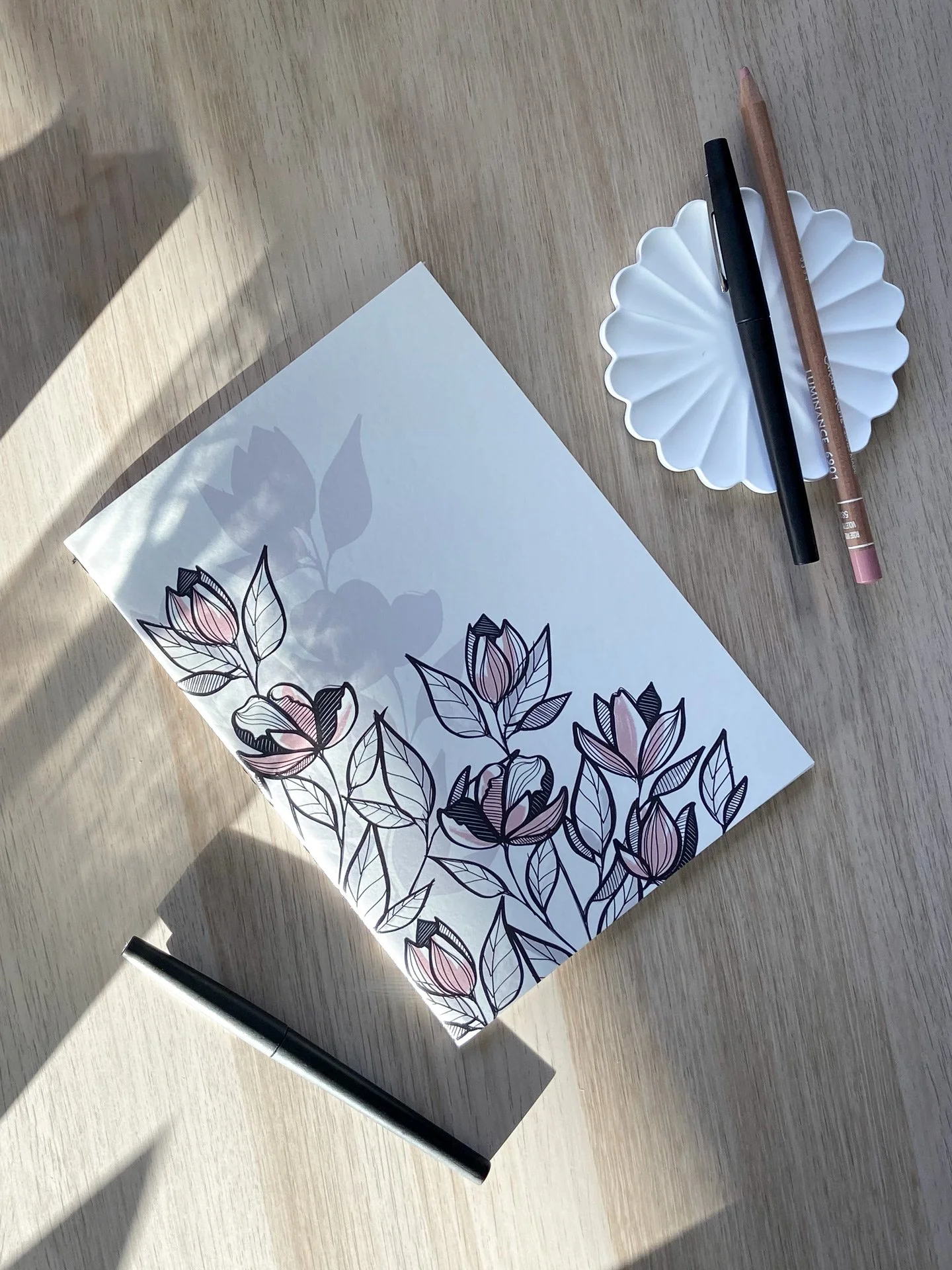 carnet-bouquet-couverture-sur-bureau.jpg