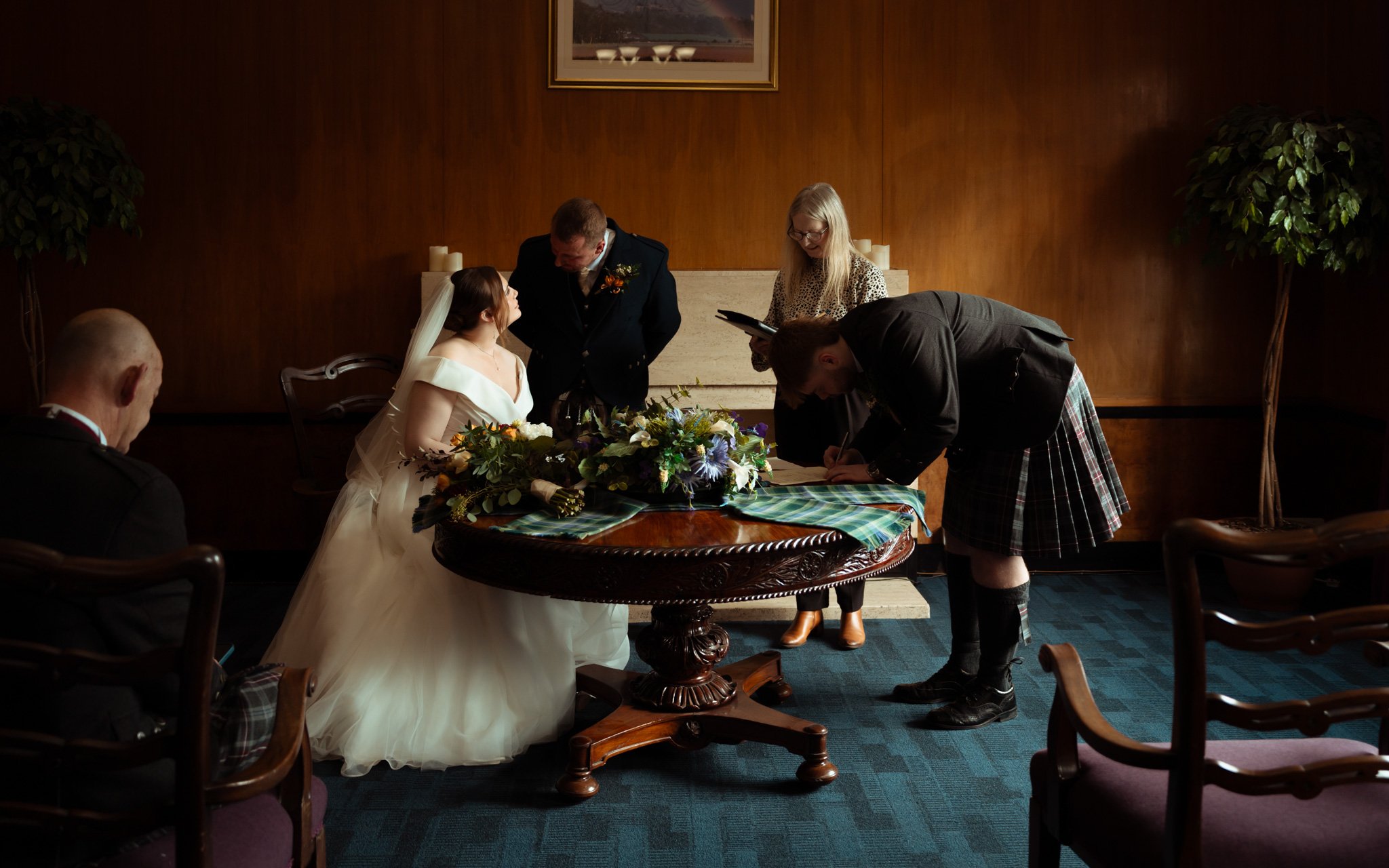 Couple--signing-registrar-scotland.JPG