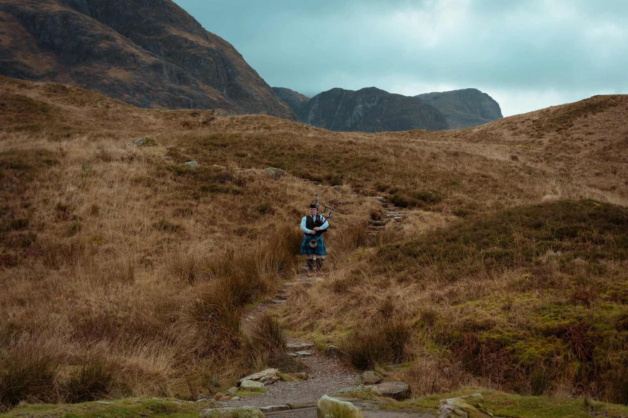 A-piper-in-the-scottish-mountains.jpg