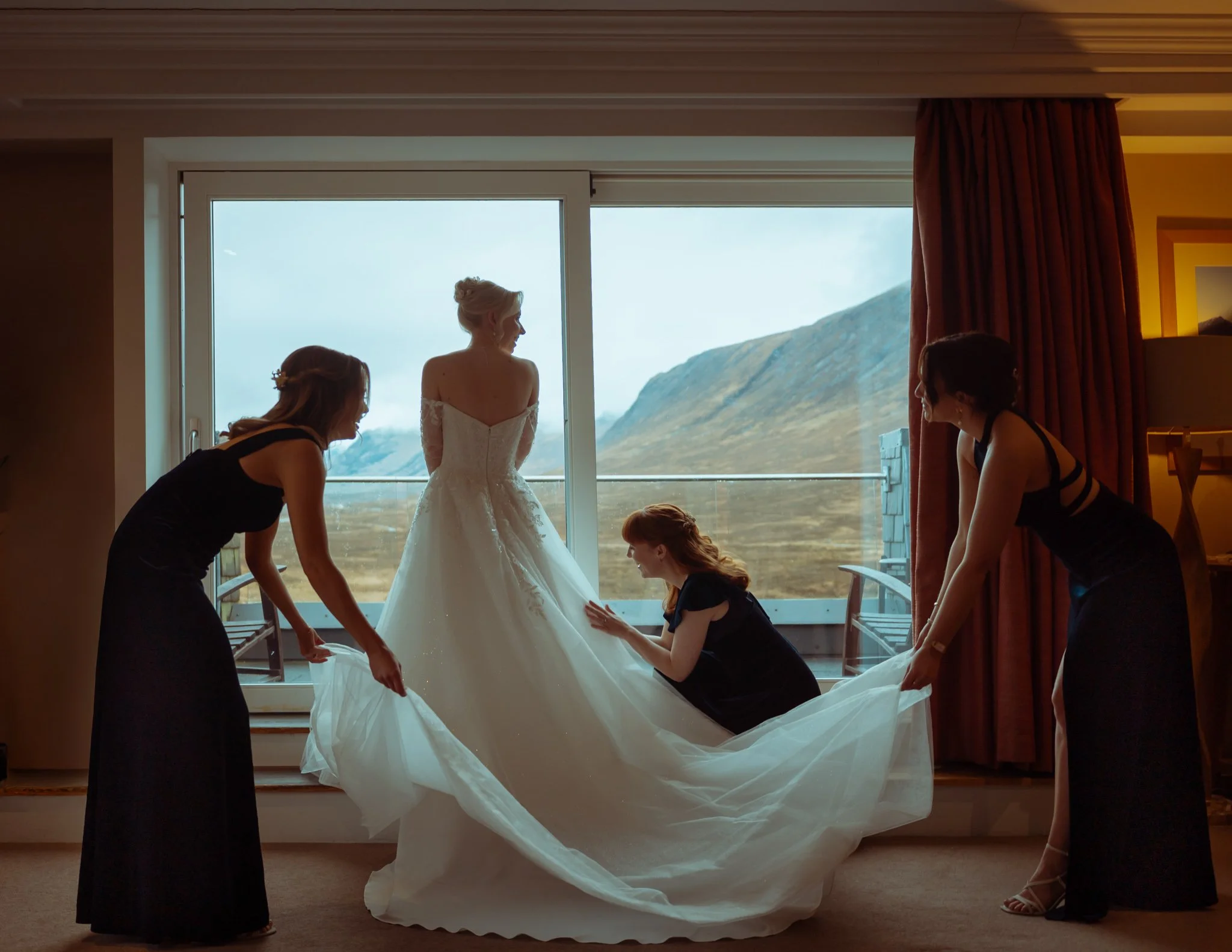 Cinematic-bride-and-bridesmaids-dress-moment.jpg