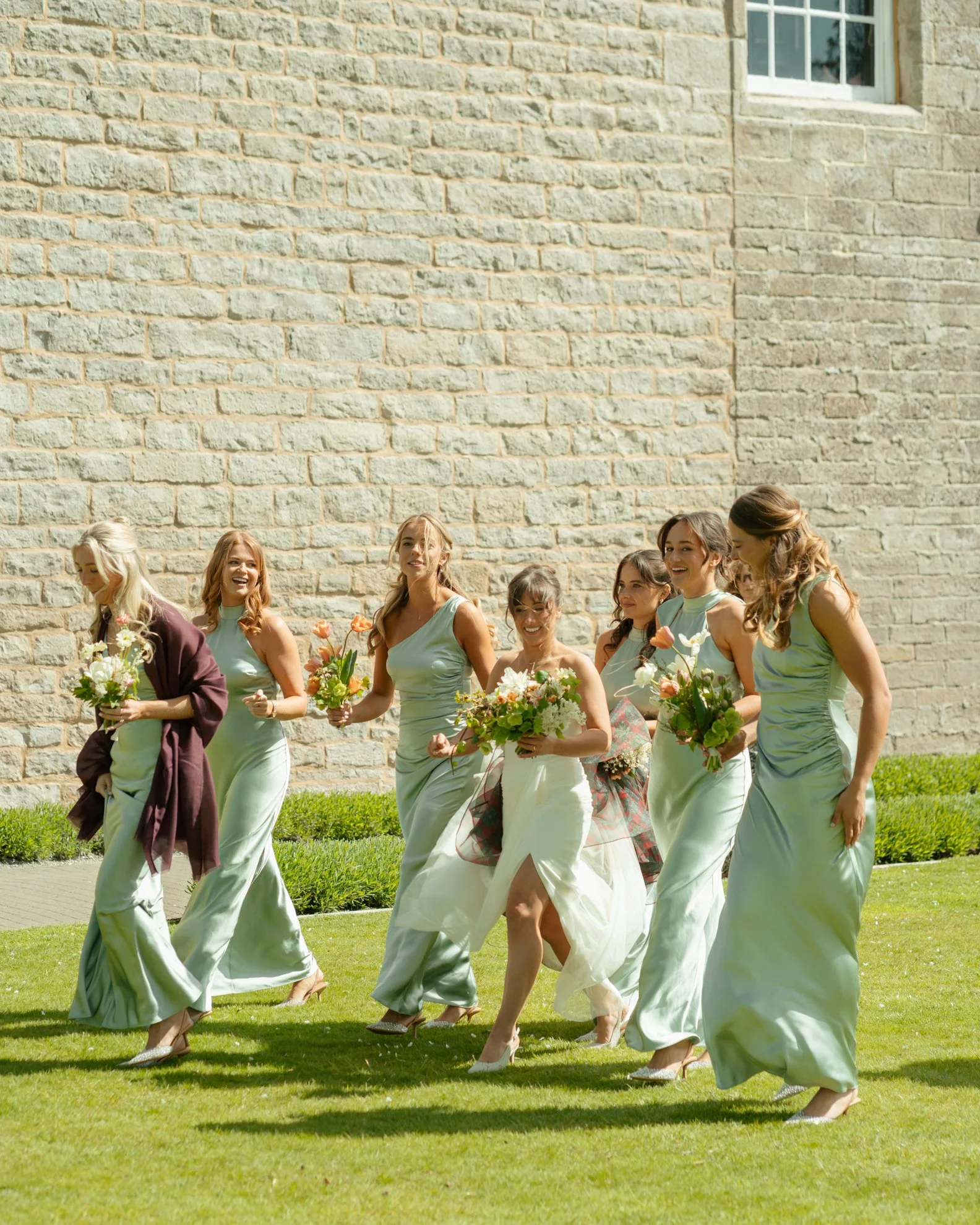 sunny-bride-and-bridesmaids-in-pastels.jpg