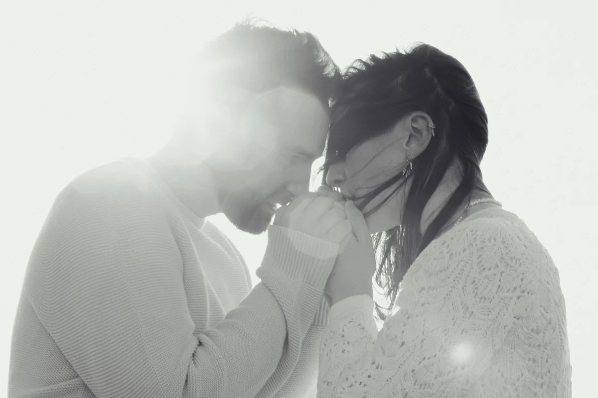 A windswept couple caught by the sun