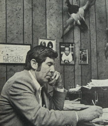 King Tire Company founder Curtis King working at his desk in the 1960's