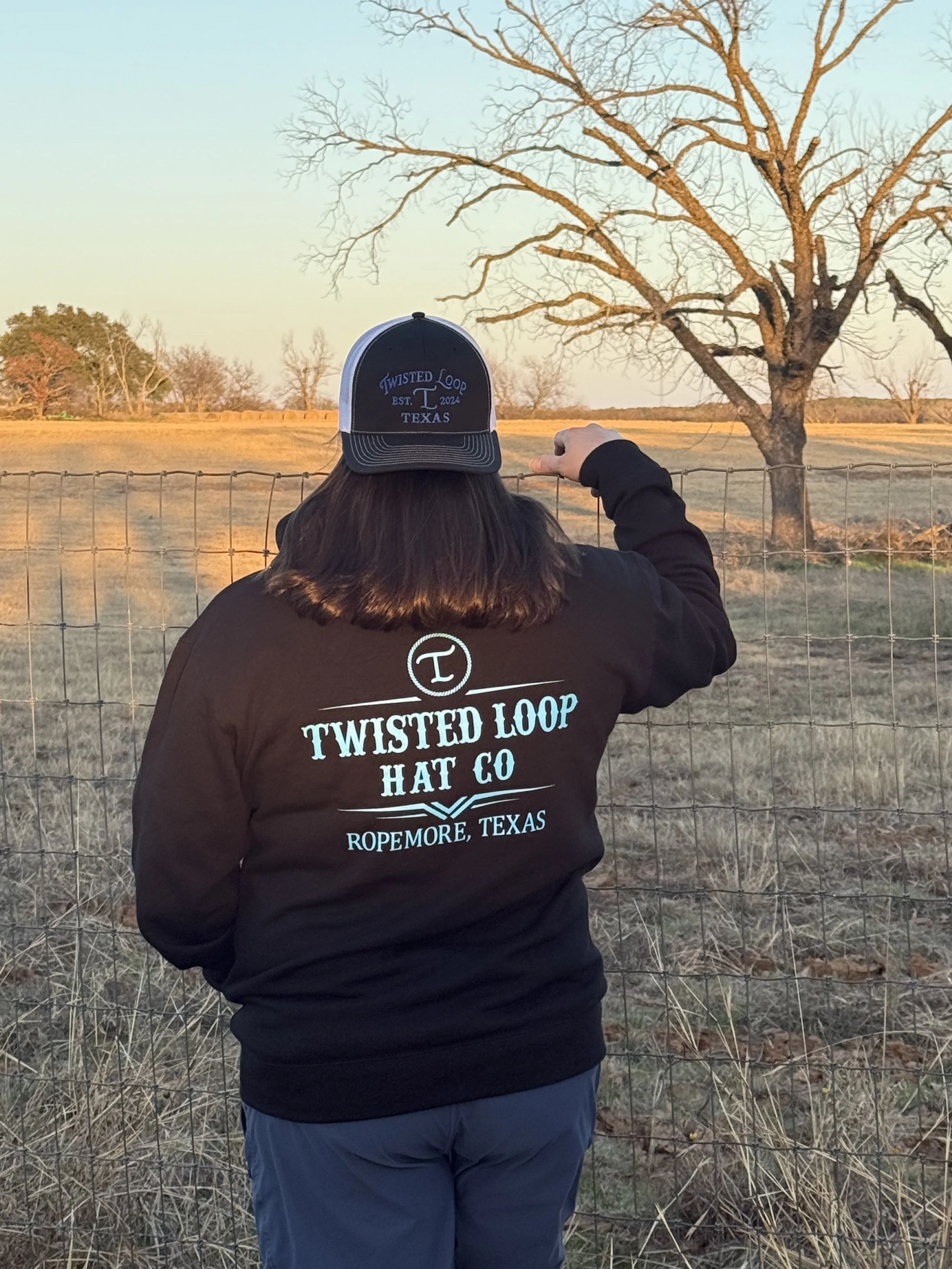 Twisted Loop Hat Co.™ Hoodie – Black with Turquoise Print