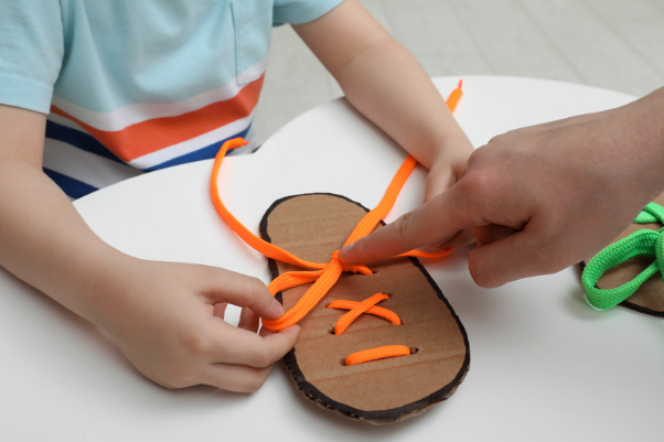 Teaching Your Child How To Tie Shoelaces