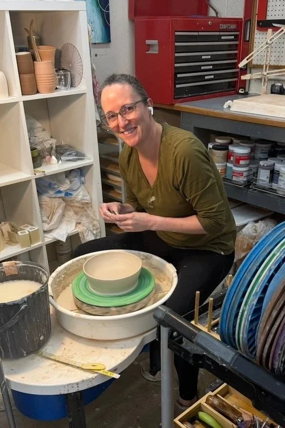Raina at the pottery wheel