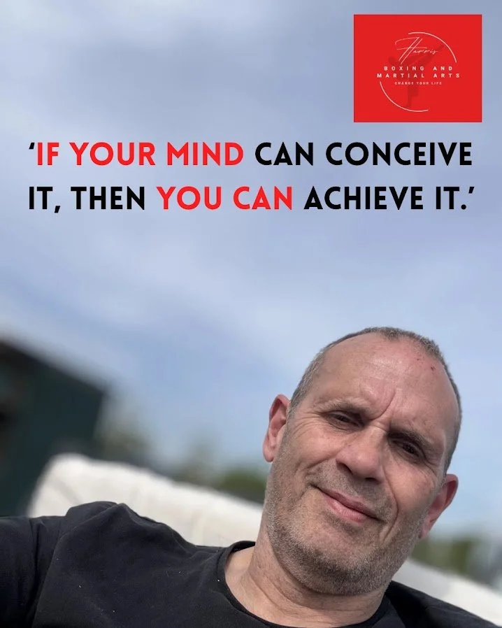 Lee Harris a smiling middle-aged man. A Professional Leader. The image contains a motivational quote and a logo in the upper right corner that reads 'Harris Boxing and Martial Arts'.