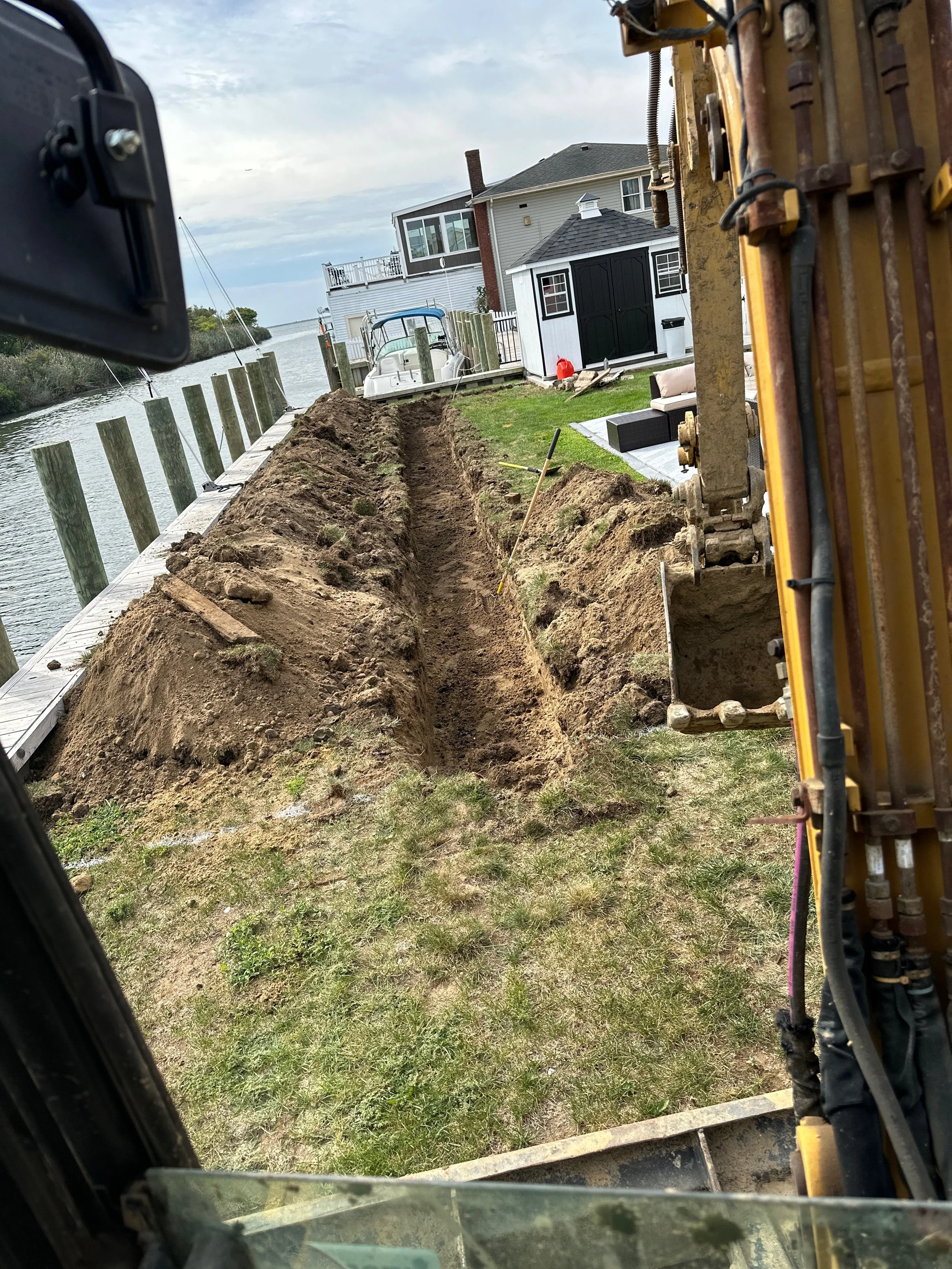 Lindenhurst, NY - Trenching For Generac Cables - Utilities Installation