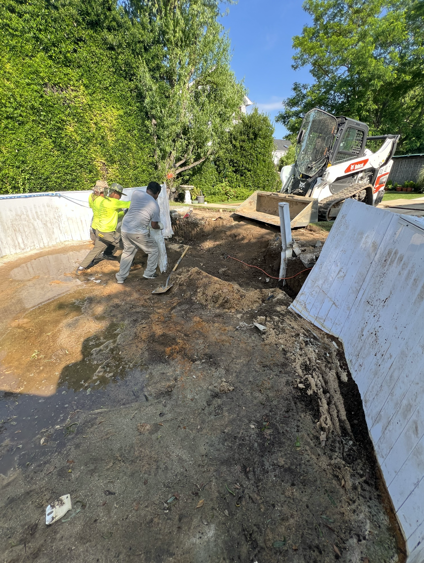Massapequa, NY - Pool Removal with Back Fill & Top Soil