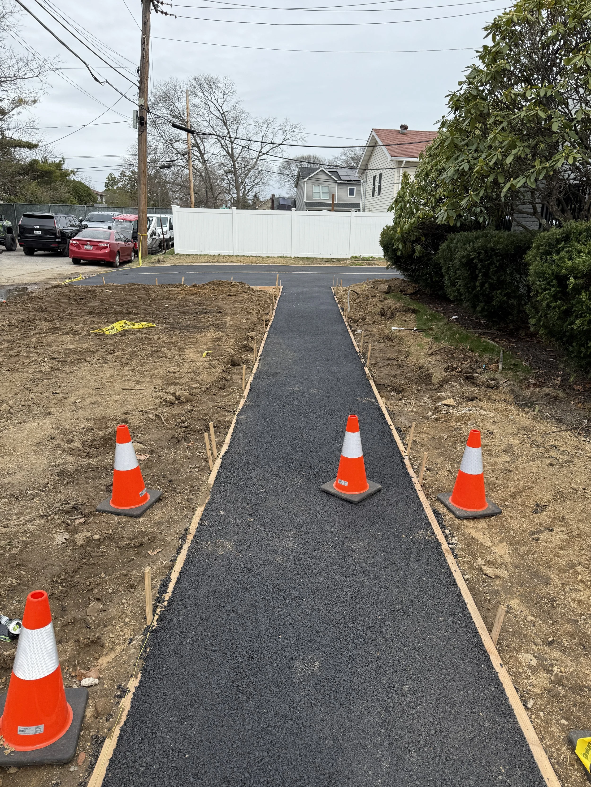 Amityville, NY - Commercial front yard complete land clearing, 2 driveway & walkways, asphalt installation | High Idle Excavation | Long Island