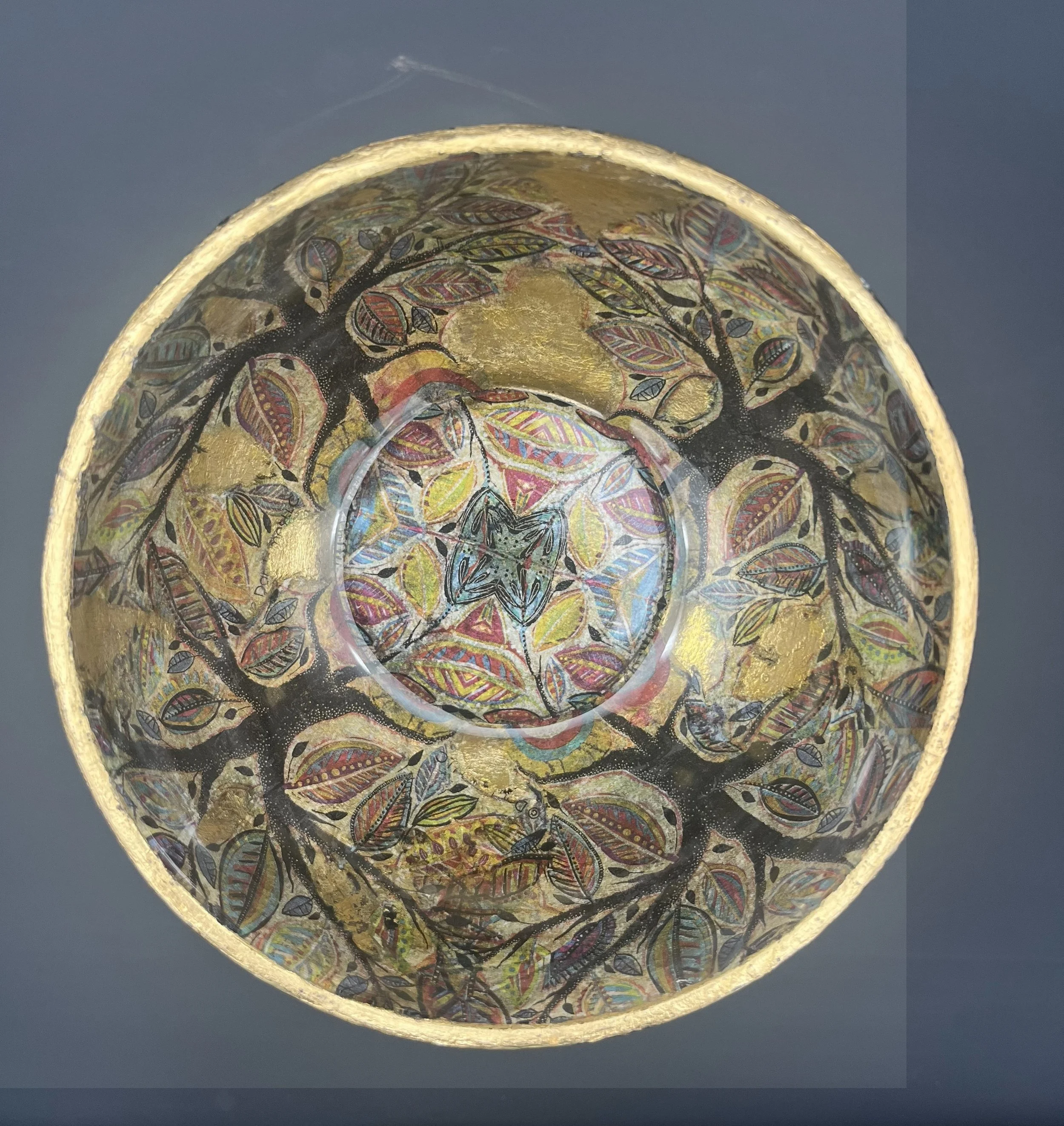 Title: Chalice II
Artist: Vincent Dion Stringer
Medium: Mixed Media Sculpture
Materials: Reclaimed ceramic bowl, gold-leafed stem, decoupage paper (interior and exterior), multi-layer varnish, mandala, and botanical motifs

Description:
Chalice II is