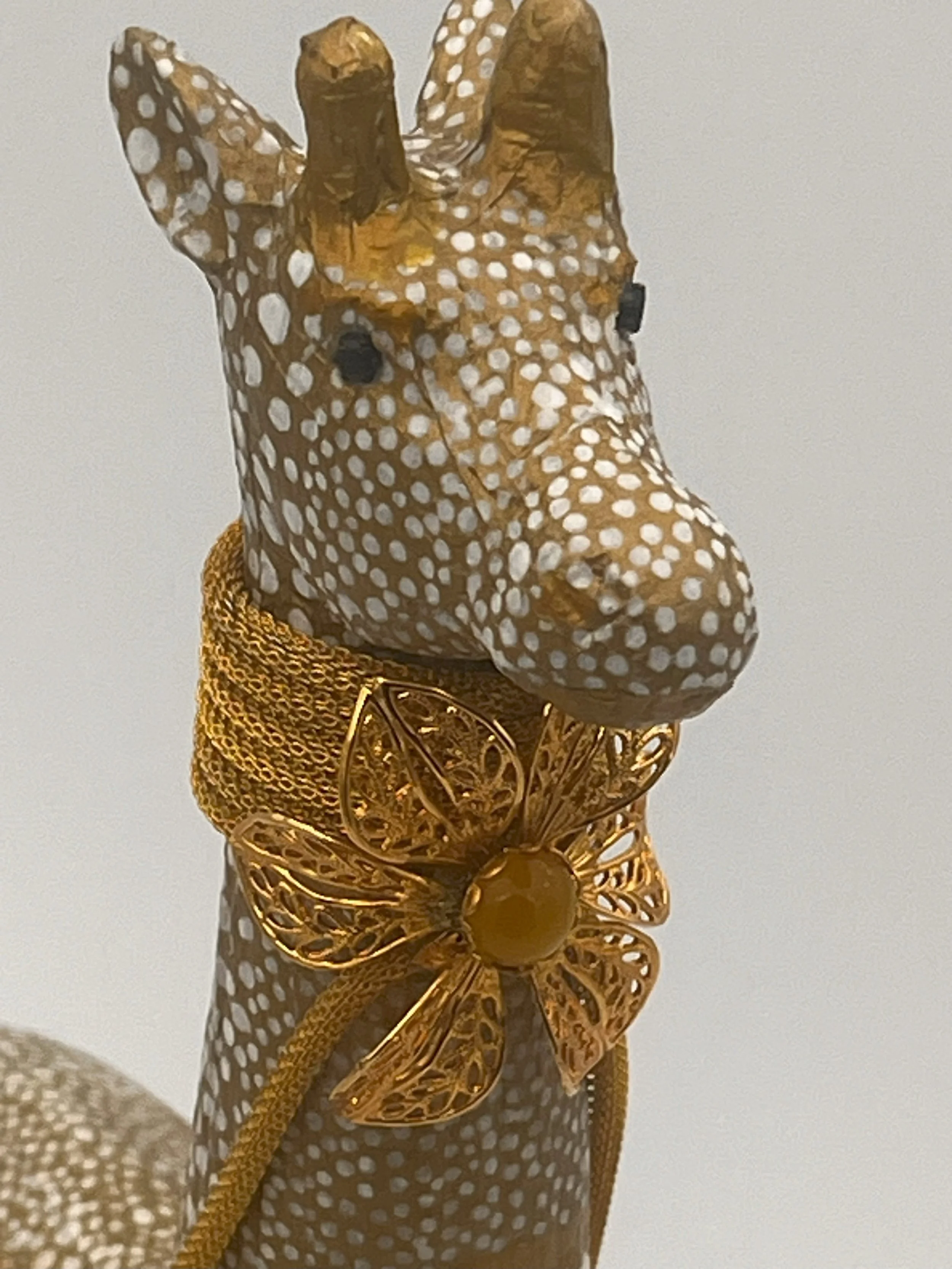 Golden Giraffe (2024) facial closeup.jpeg