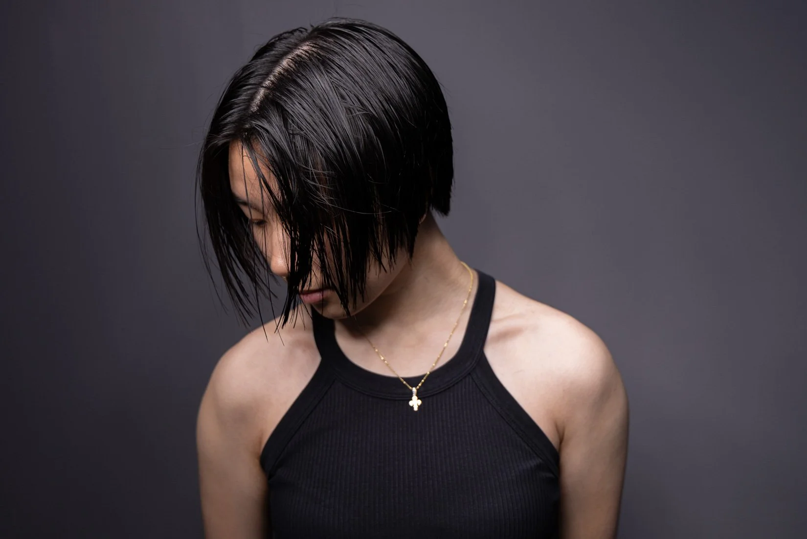 Short haircut on Asian woman's hair. Haircut with lots of layers and texture cut my Asian hair specialist
