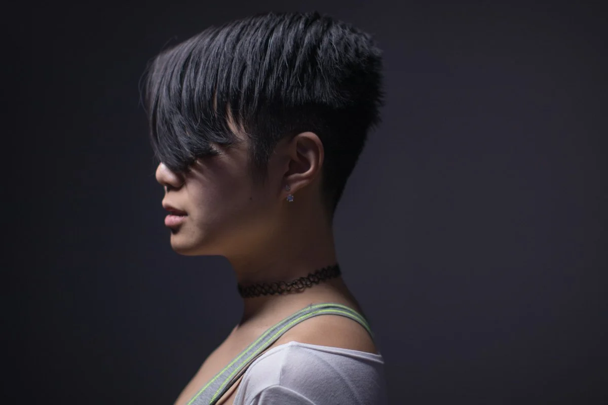 black hair, pixie cut, short hair, textured layers,