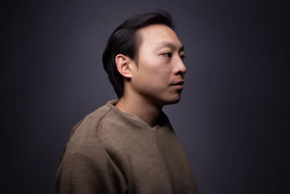 Asian men's haircut with texture and long bangs