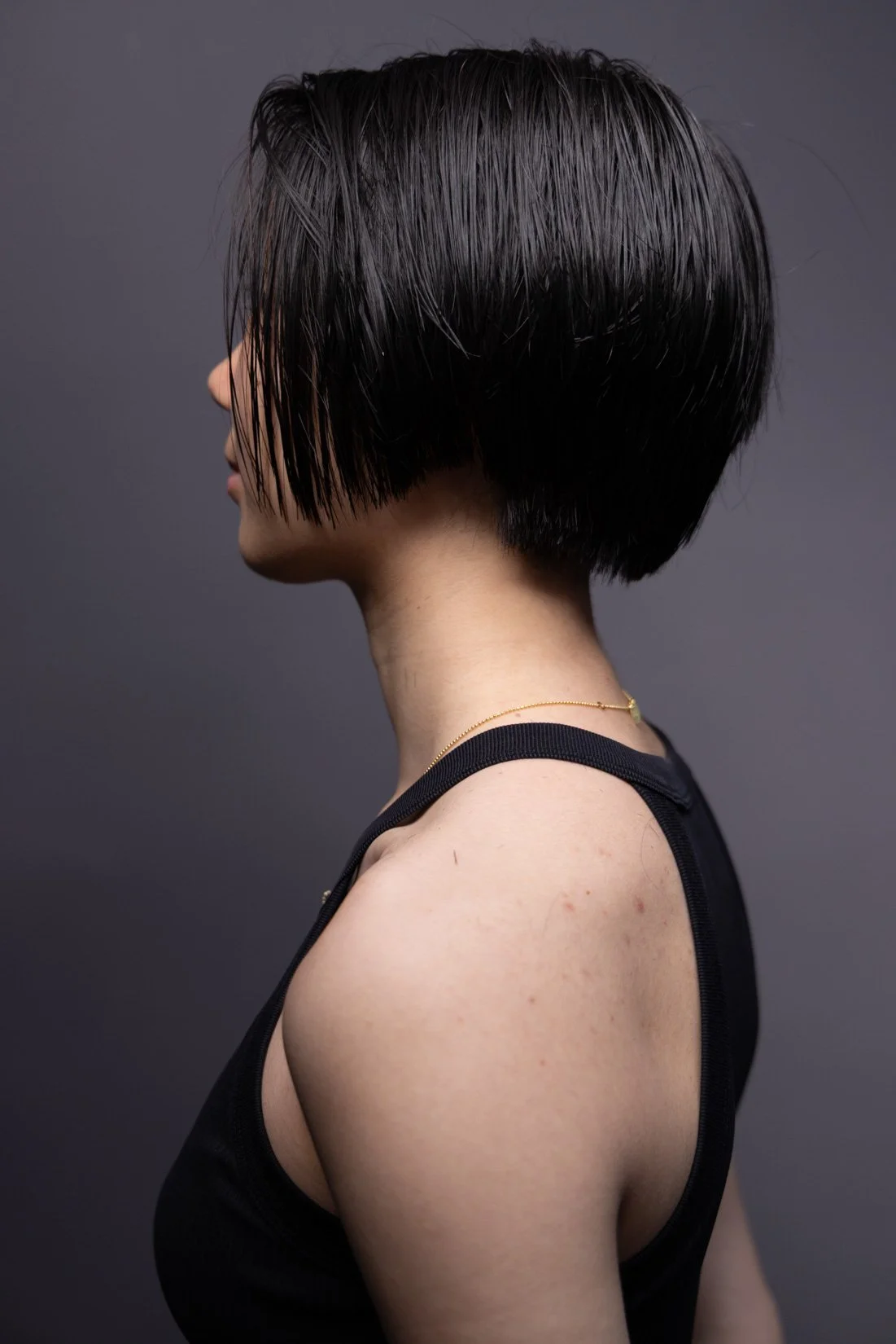 Short haircut on Asian woman's hair. Haircut with lots of layers and texture cut my Asian hair specialist
